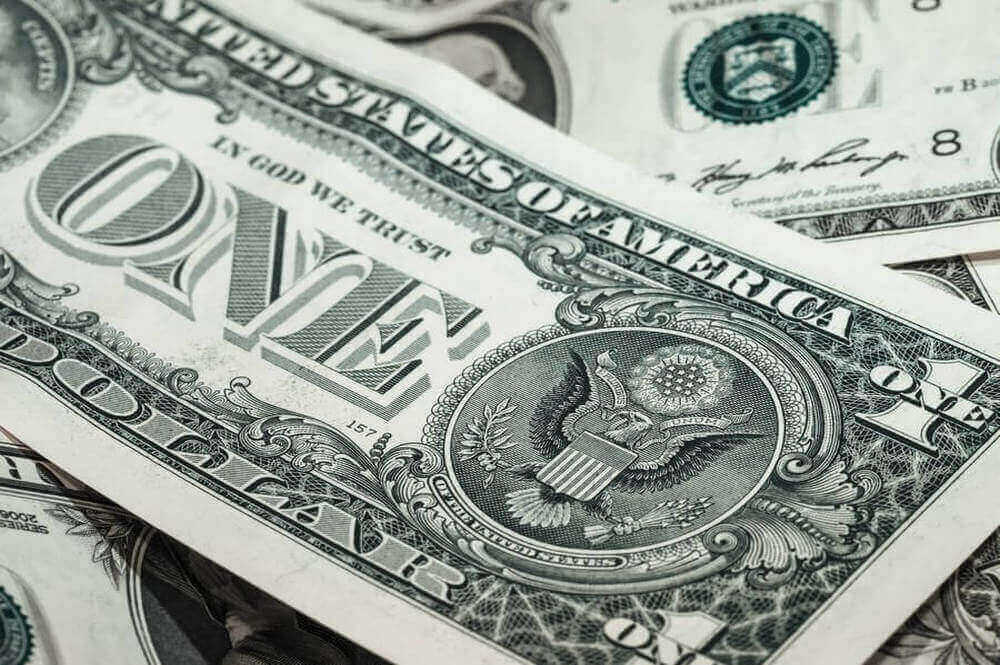 A one US dollar bill | Guide My Growth